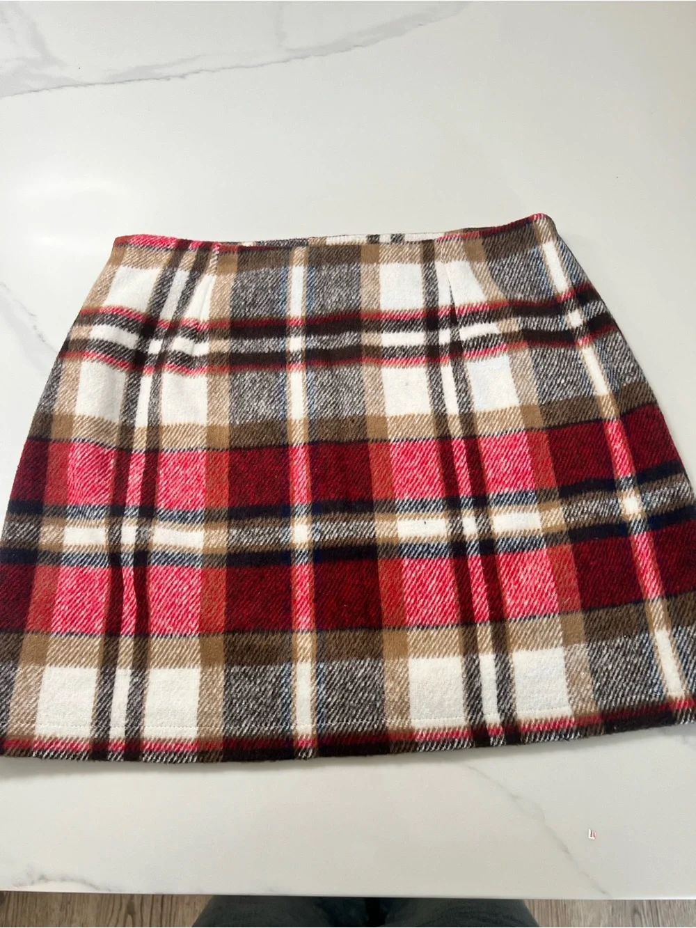 Plaid Mini Skirt in Red and Brown. Comes with size zipper. Size M